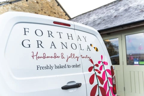 Back of van showing Forthay Granola branding