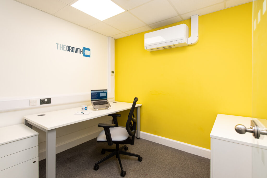 Image of office with yellow wall