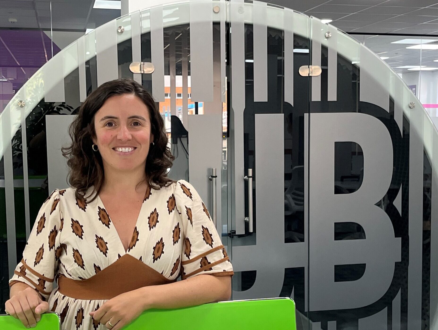 Eva Tunez standing in front of the Hub pod.